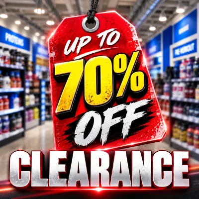 Clearance sale at Natural Body with up to 70% off on a red sale tag against blurred supplement store shelves.