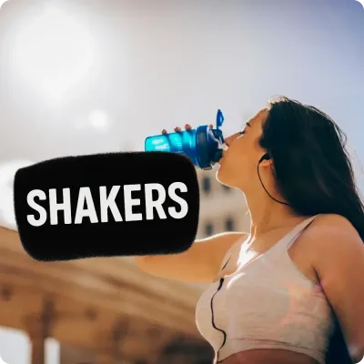 Woman drinking from a blue shaker with Shakers text, highlighting a selection of shaker bottles for fitness and supplements.