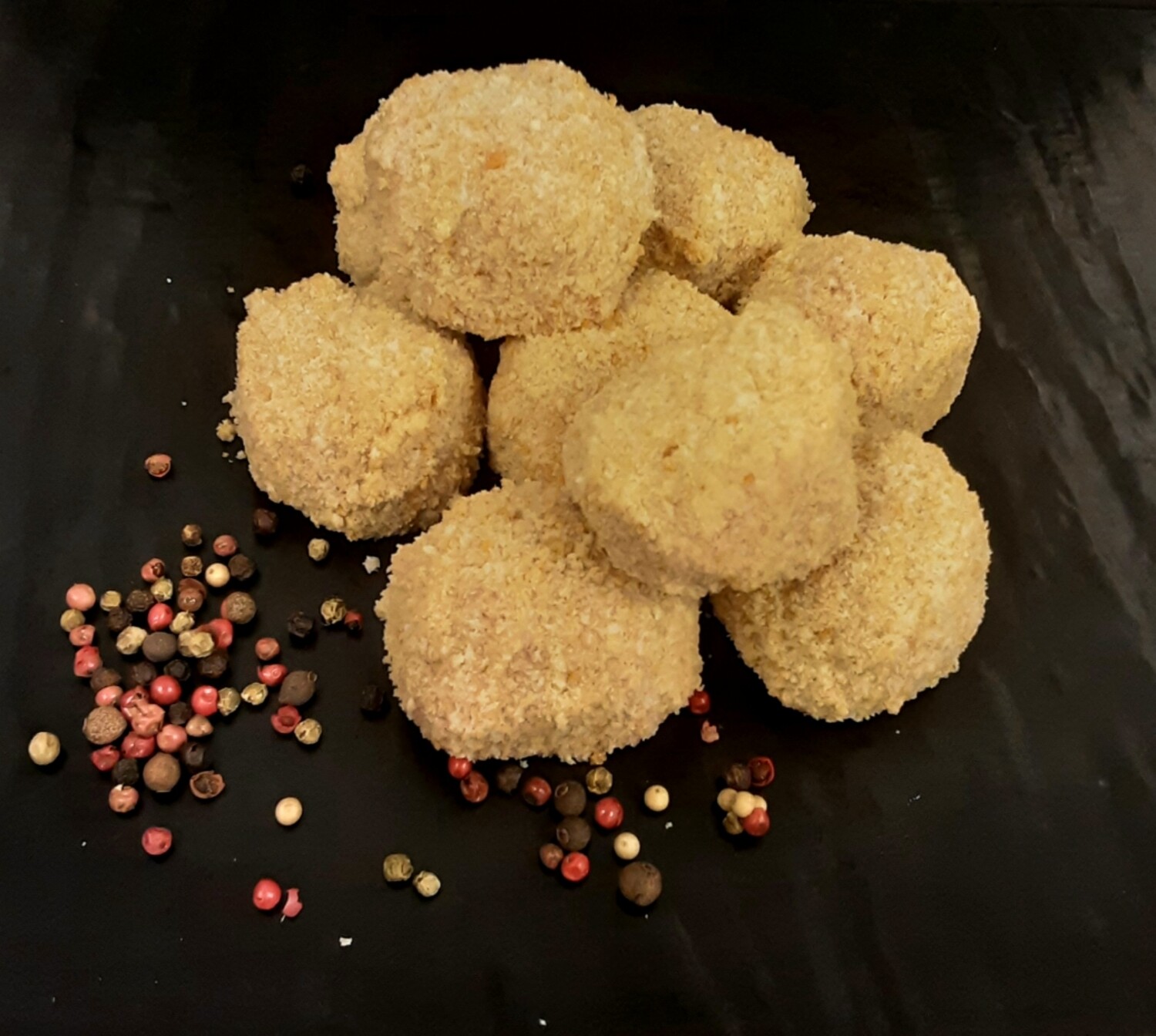 Bombes amb salsa al pebre verd 12,00 €/kg