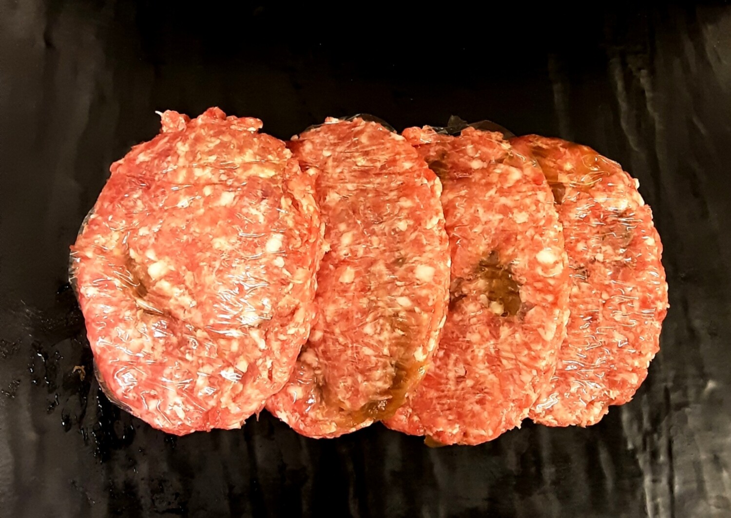 Hamburgueses amb ceba caramelitzada 11,90 €/kg