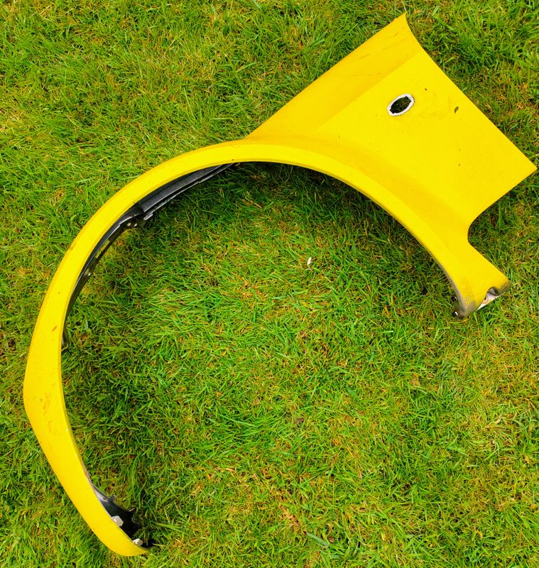 Nearside Front Wing Yellow on Silver