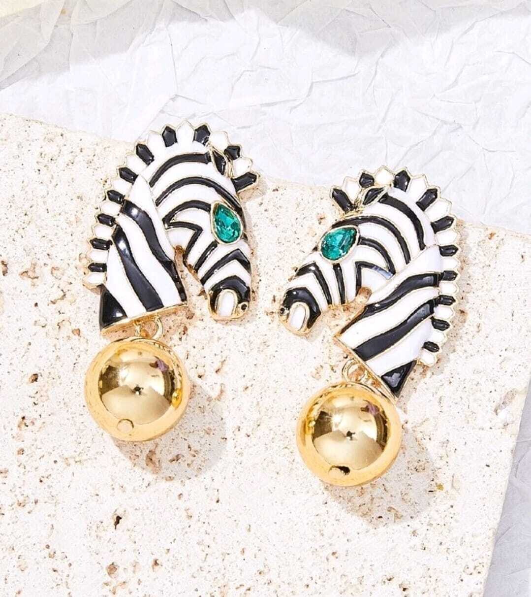 Brincos Zebra