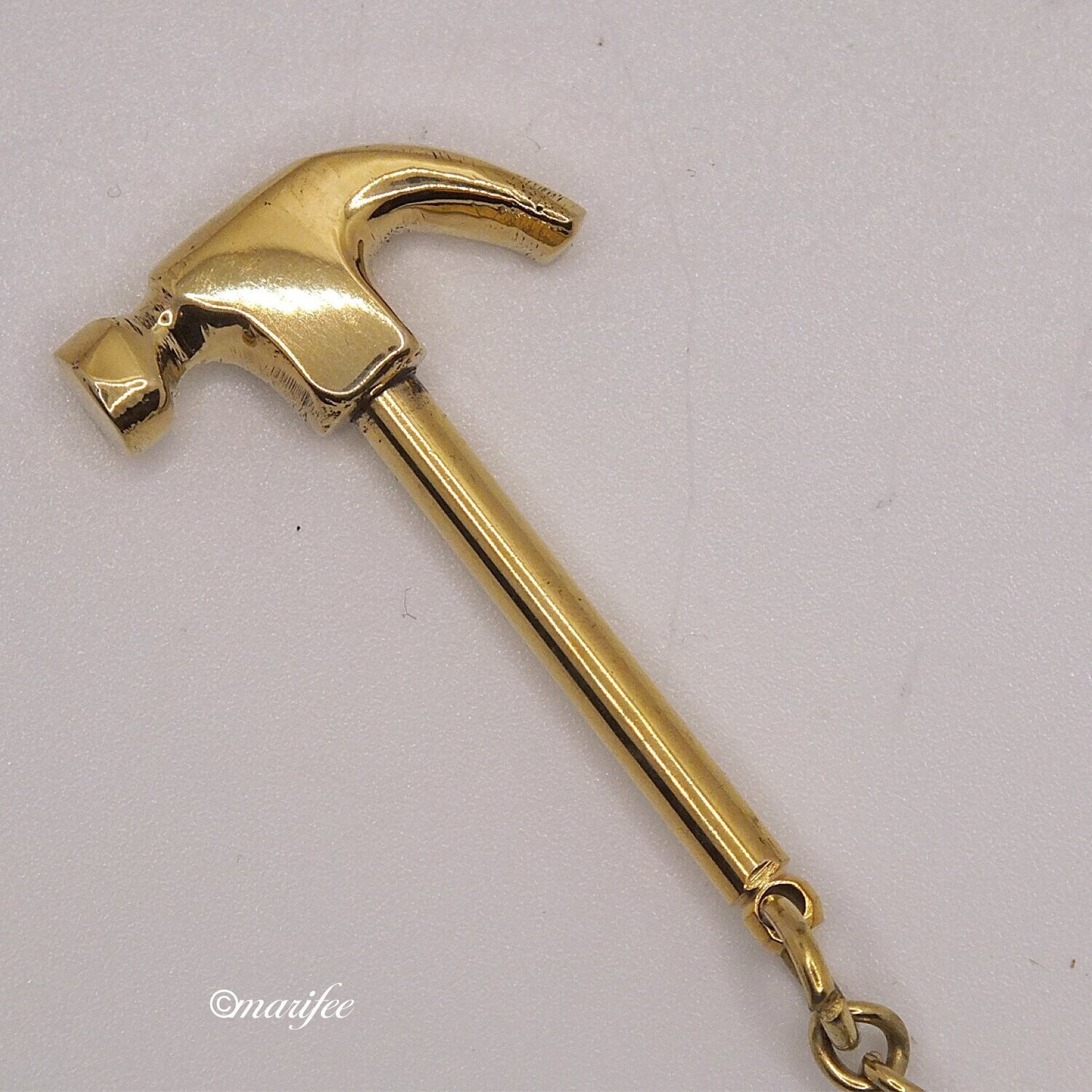 Schlüsselanhänger Klauenhammer 49 x 27 mm, Messing