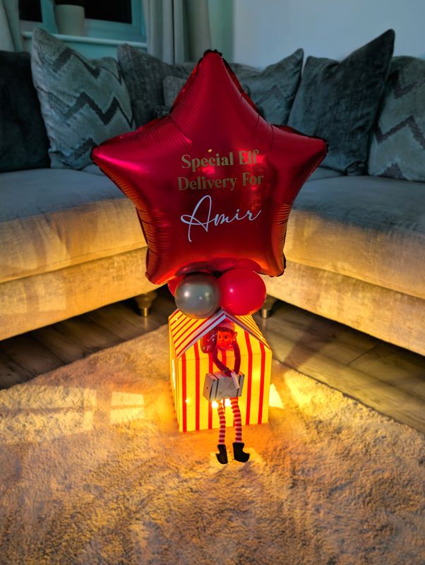 Elf Arrival Red Striped House Balloon Display
