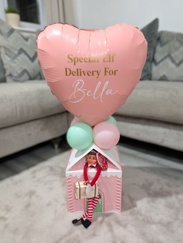 Elf Arrival Pink And White House Balloon Display