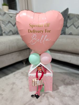 Elf Arrival Pink And White House Balloon Display