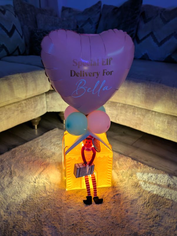 Elf Arrival Pink And White House Balloon Display