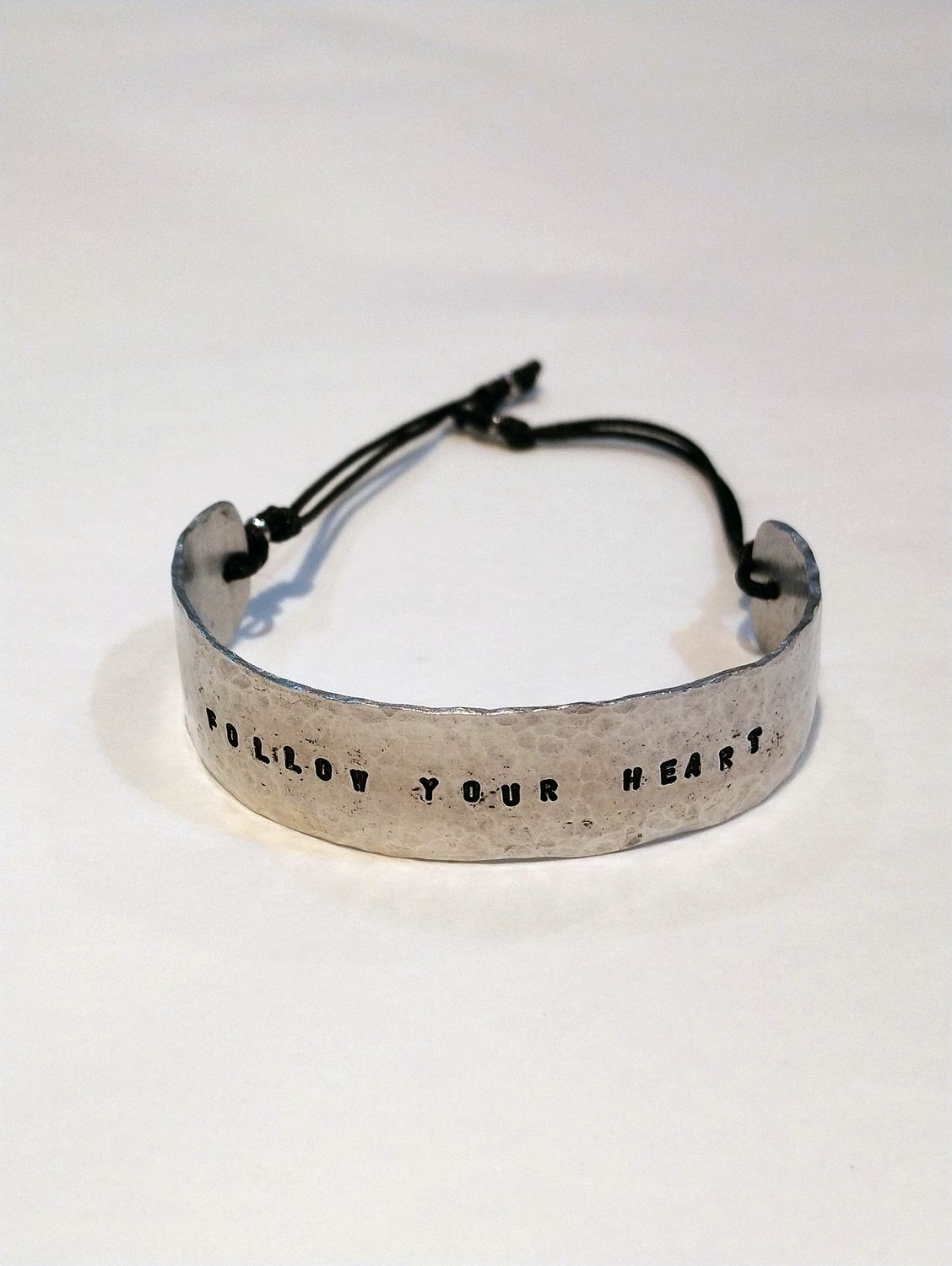 Bracelet jonc &quot;FOLLOW YOUR HEART&quot;