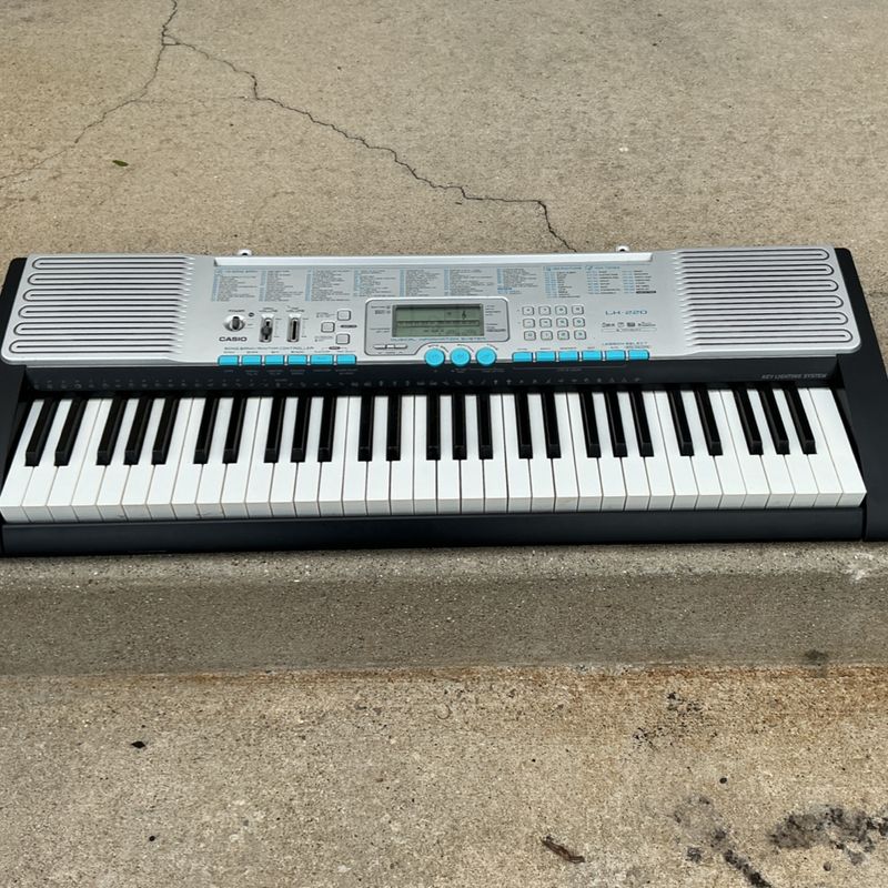 Casio LK-220 61-Key Lighted Electric Piano Keyboard
