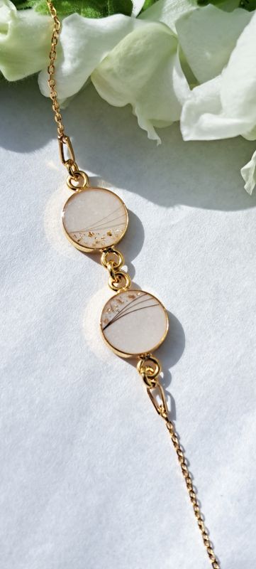 Armband met 2 bedels zilver/verguld goud