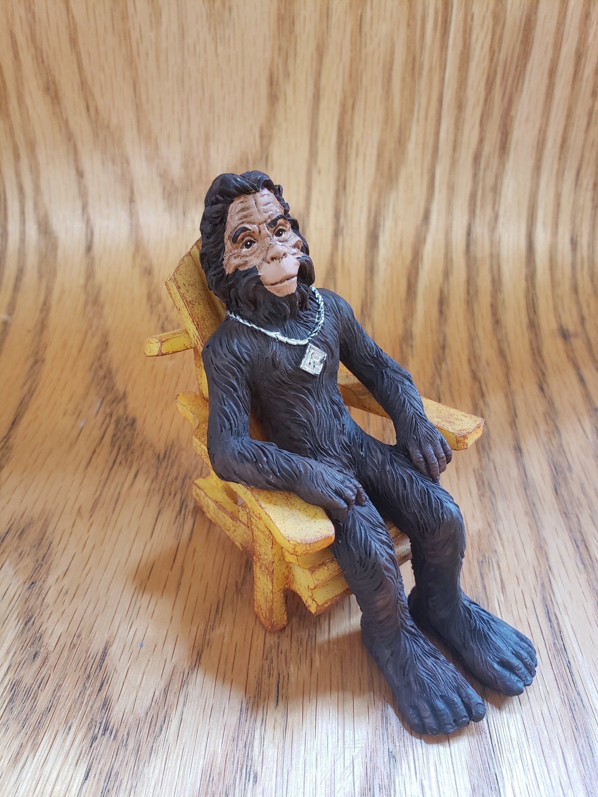 Bigfoot in natural Adirondack Chair Figurine