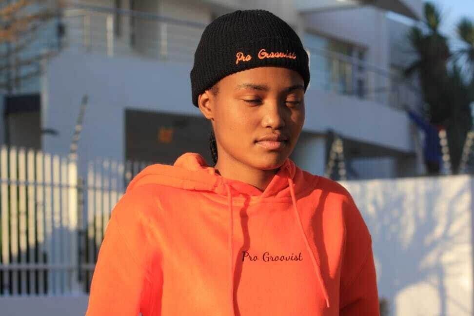 Pro Groovist Orange Hoodie and Black Beanie