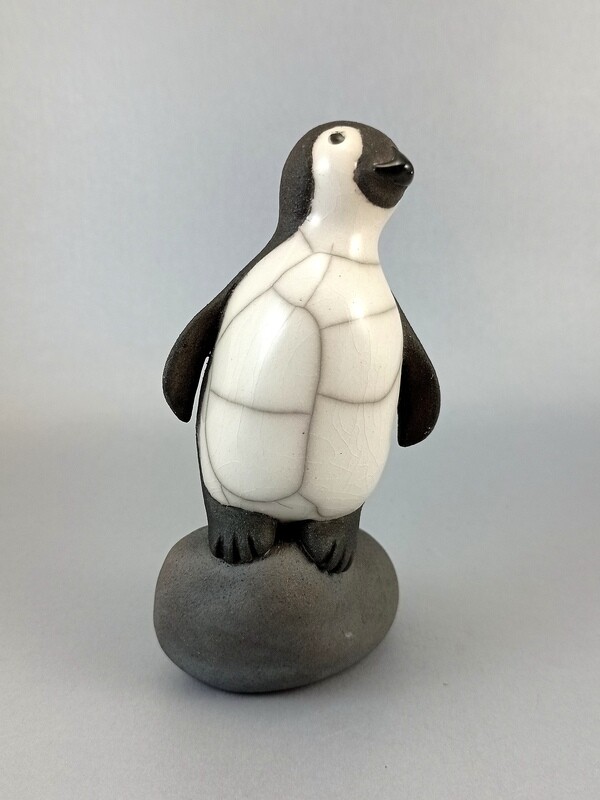 Penguin on wonky Rock