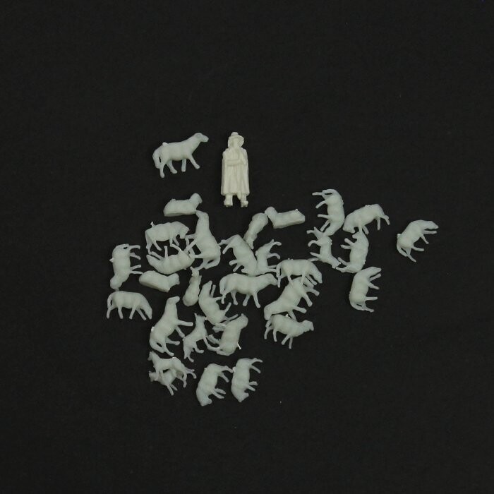 Miniatuur herder met schapen