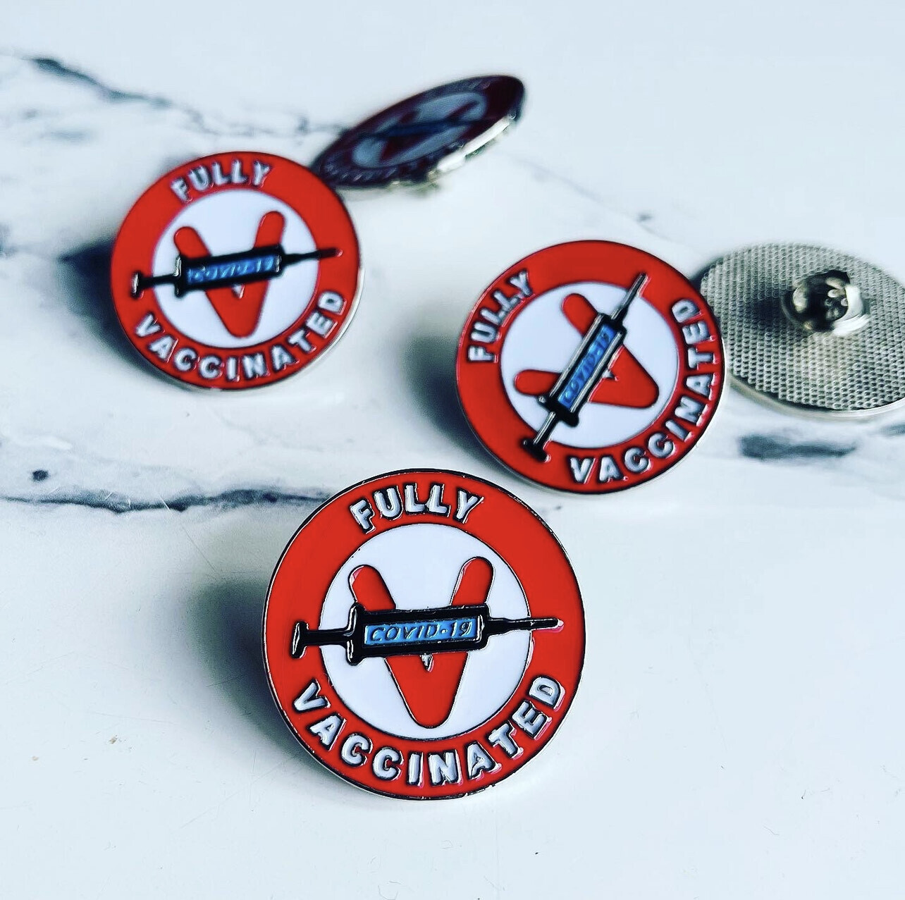 V Badge