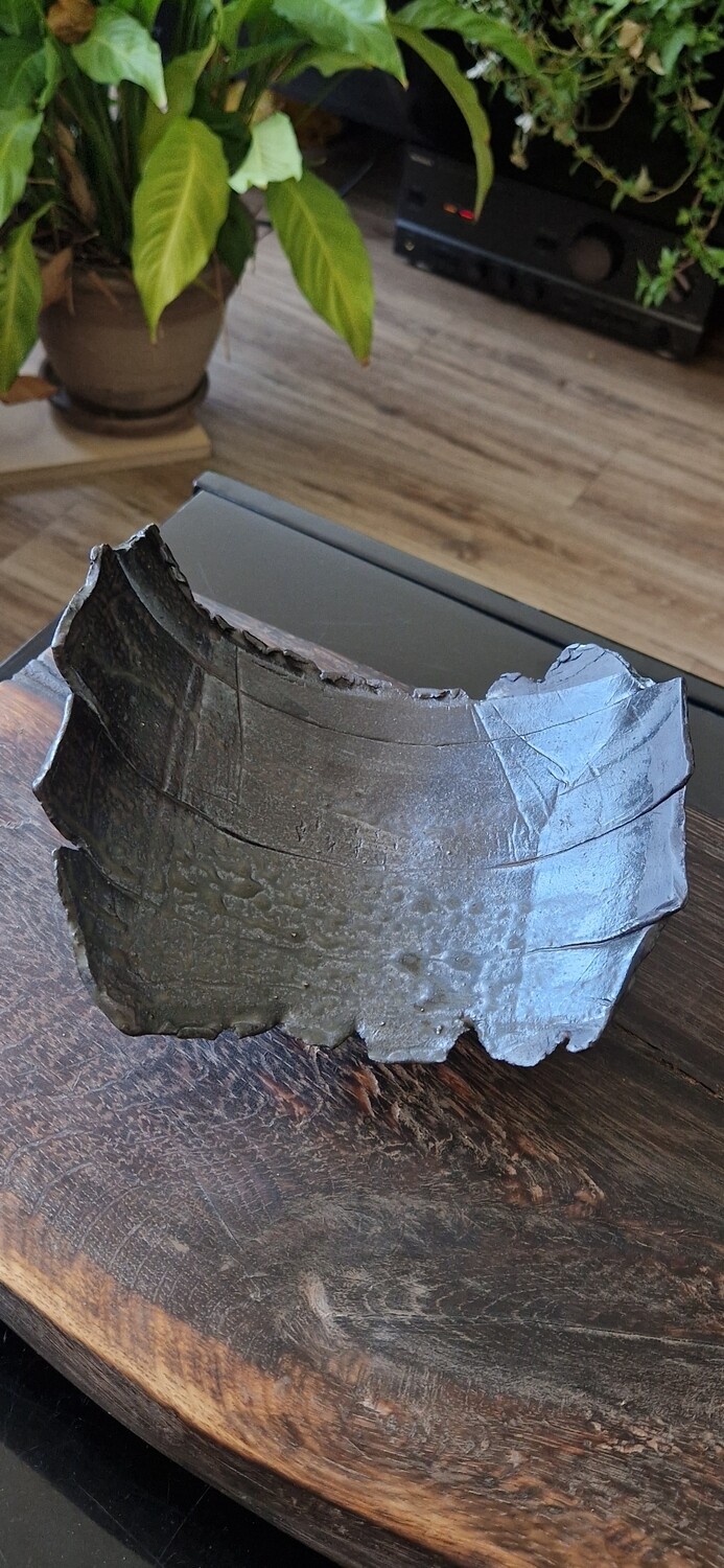 Asymmetrical serving plate