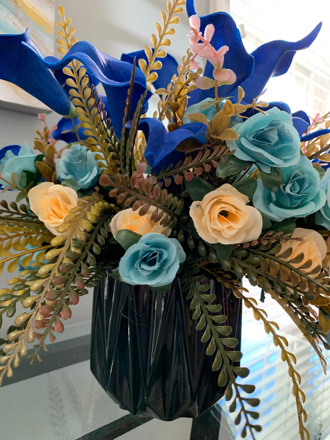 BLUE CALLA LILY AND BLACK VASE