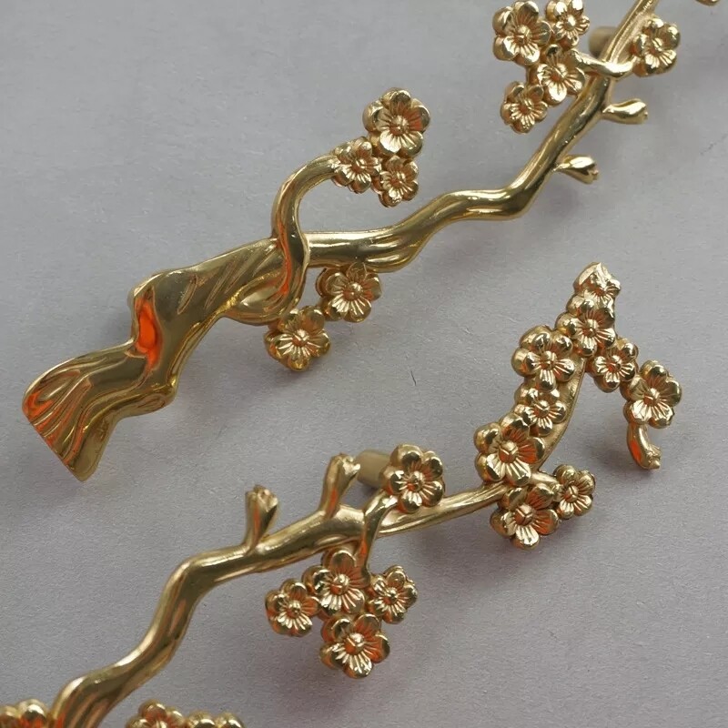 A Pair of Gold brass  flowering cherry tree door handles