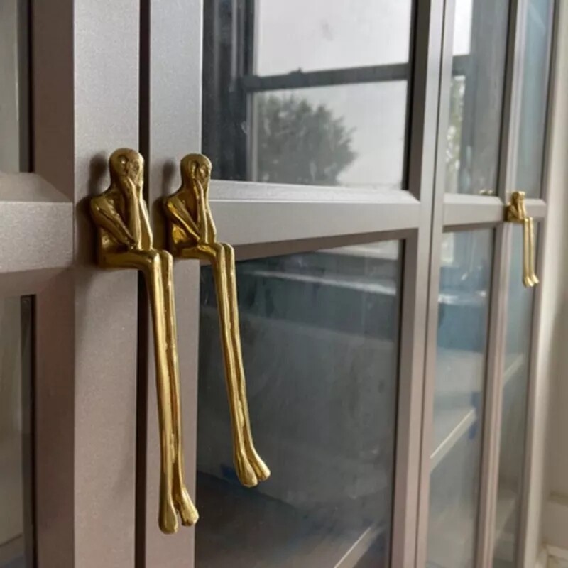 Gold brass man shaped figure door handle