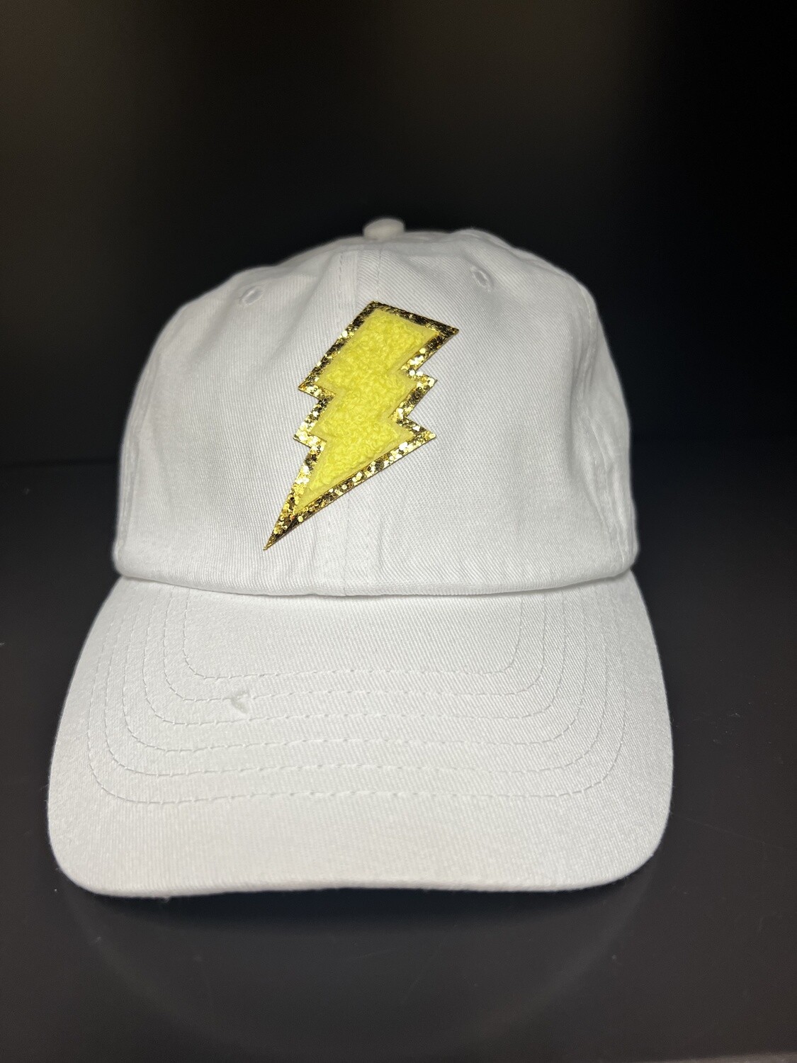 Yellow Lightning Bolt Patch on White Cap
