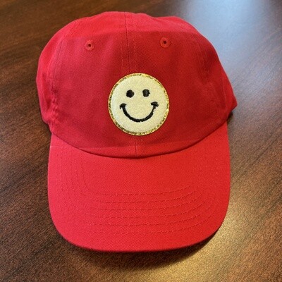 White Smiley Patch on Red Cap