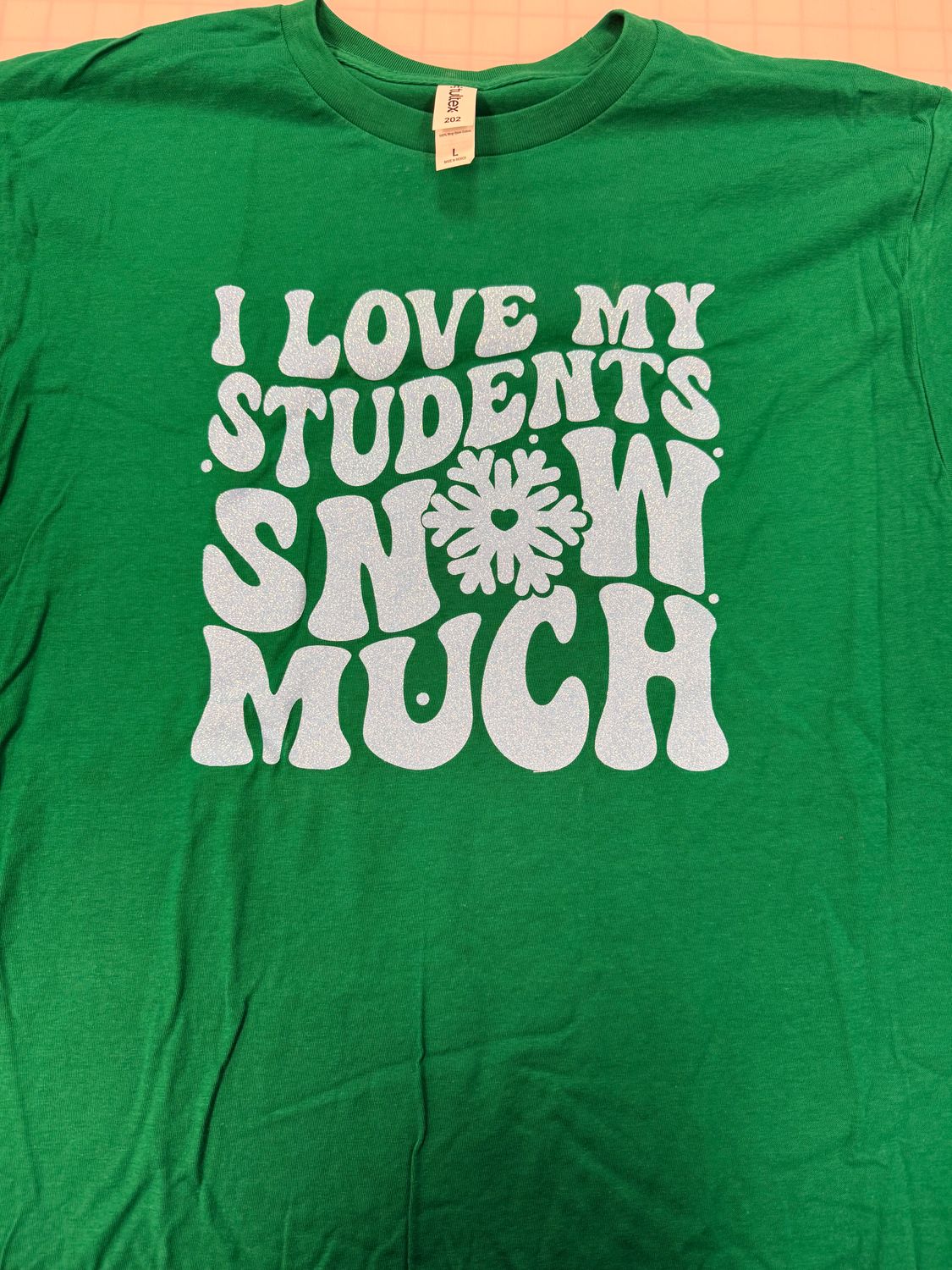 (L) I Love My Students Snow Much - Glitter Neon Blue - Short Sleeve Kelly Green
