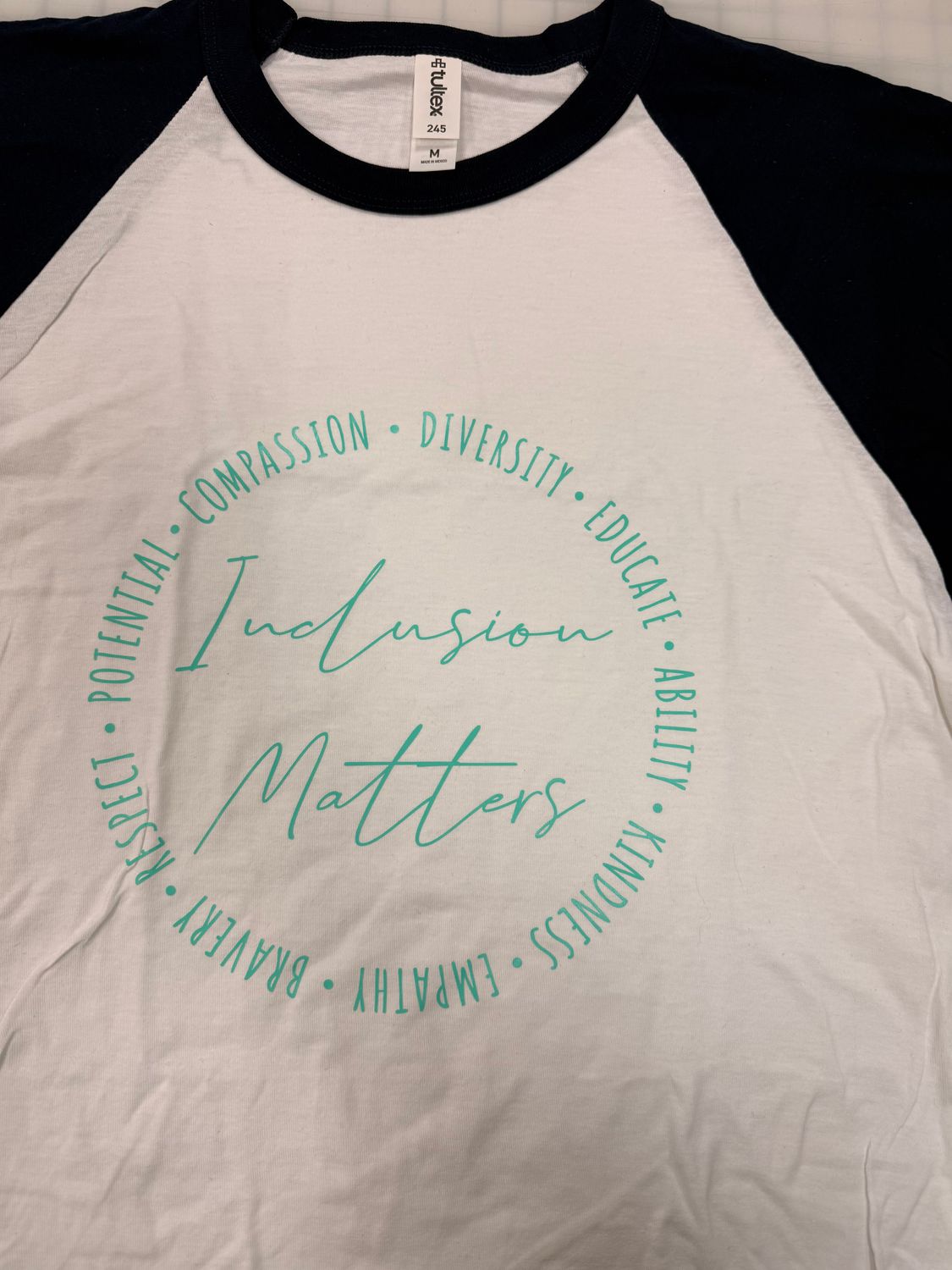 (M) Inclusion Matters - Raglan White w/ Navy Sleeves