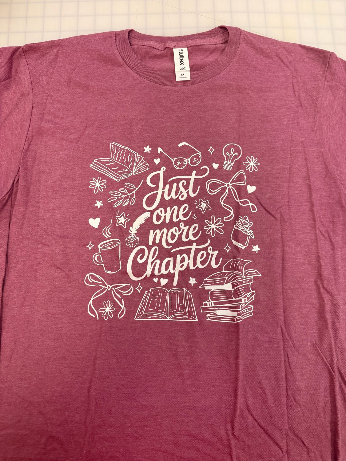 (M) Just One More Chapter - Short Sleeve Heather Cassis (M) Just One More Chapter - Short Sleeve Heather Cassis