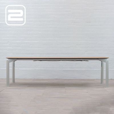 BULO Vergadertafel B270xD101xH78 - Bruin Hout / Alu Vierpoot BULO Vergadertafel B270xD101xH78 - Bruin Hout / Alu Vierpoot