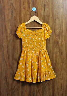 Yellow smoked dress(4 to 12 Yrs)