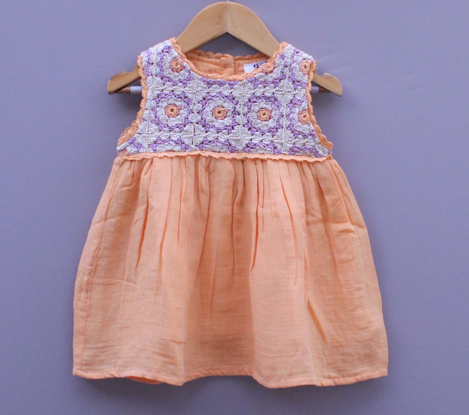 ​Yello orange Frock with Crochet Yoke Design