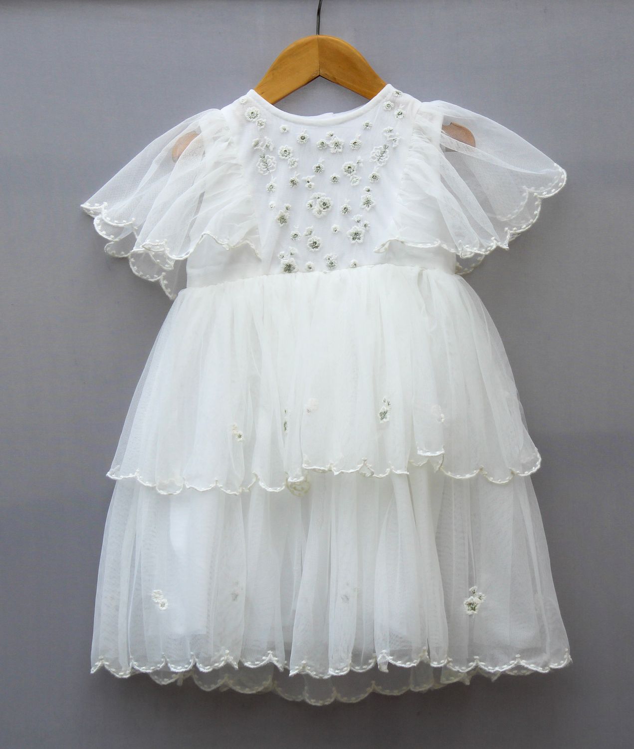White Layered Net Party Frock for Girls – Floral Embroidered Design