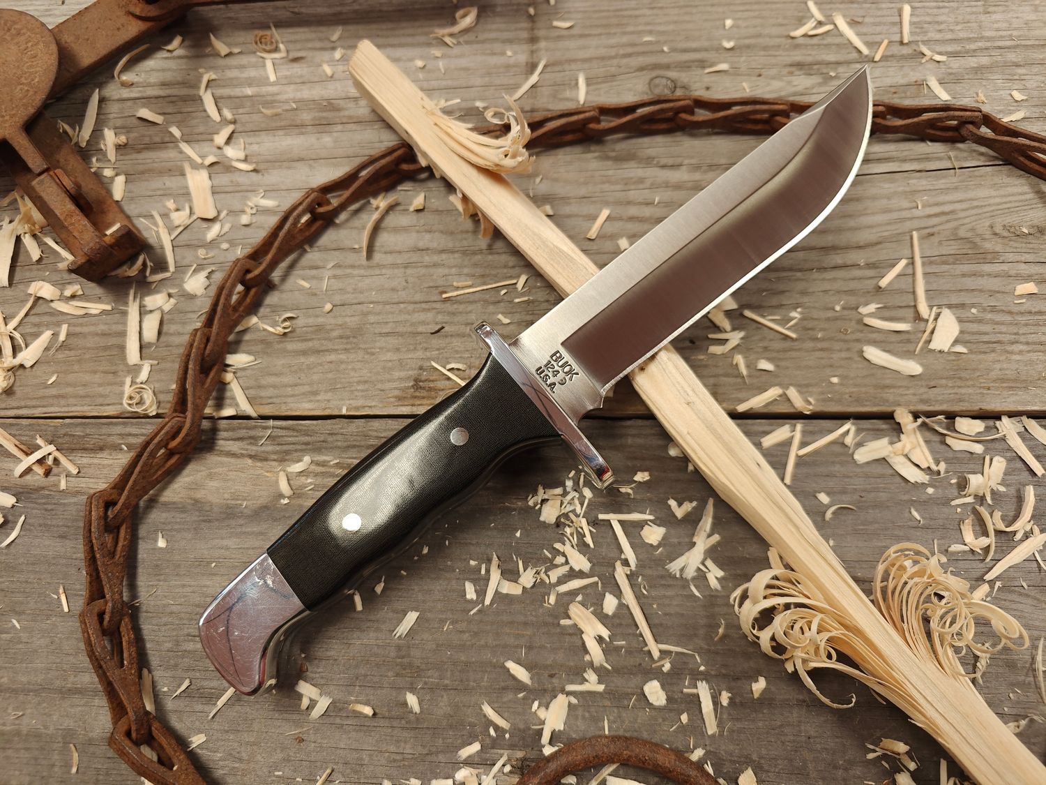 Buck 124 Frontiersman 4.75″ Fixed Blade / Black Micarta &amp; Aluminum Bolster / Satin 420HC (Pre-Owned)