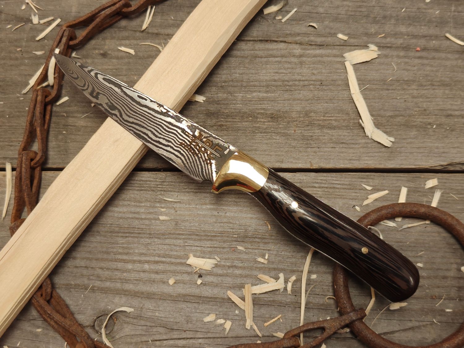 ABE Knives 4.25" Fixed Blade / African Wenge With Brass Bolster / 28 Layer Damascus With 80crv2 / 15n20 ABE Knives 4.25" Fixed Blade / African Wenge With Brass Bolster / 28 Layer Damascus With 80crv2 / 15n20
