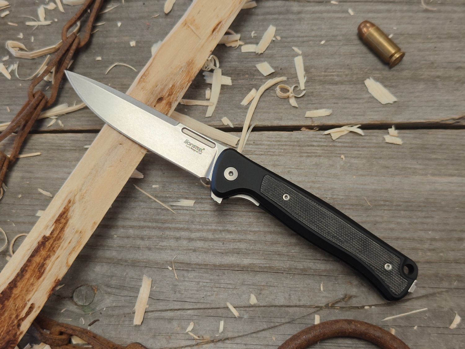 Lionsteel Skinny 3.31" Framelock Folder / Black Aluminum w/ Black Micarta Inlay / Stonewashed Magnacut