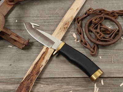 Buck Knives Zipper 4.25" Fixed Blade / Black Rubber and Brass / Satin 420HC w/ Guthook