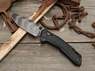 Zero Tolerance 0203 4" DuraLock Folding / Black G10 / Tiger Stripes CPM-M4