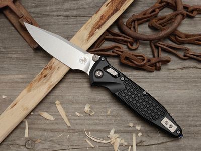 Microtech Socom Elite S/E 4" Ram-Lok / Black Frag Aluminum / Stonewash Bohler M390MK