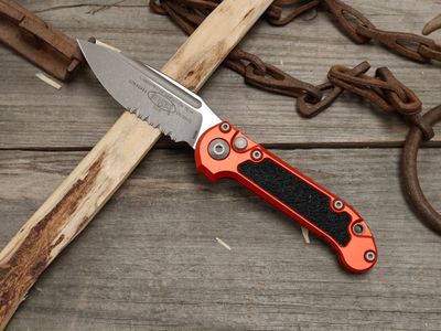 Microtech L.U.D.T Gen III 3.5" Partially Serrated S/E Push Button Automatic / Orange Aluminum / Apocalyptic Bohler M390MK