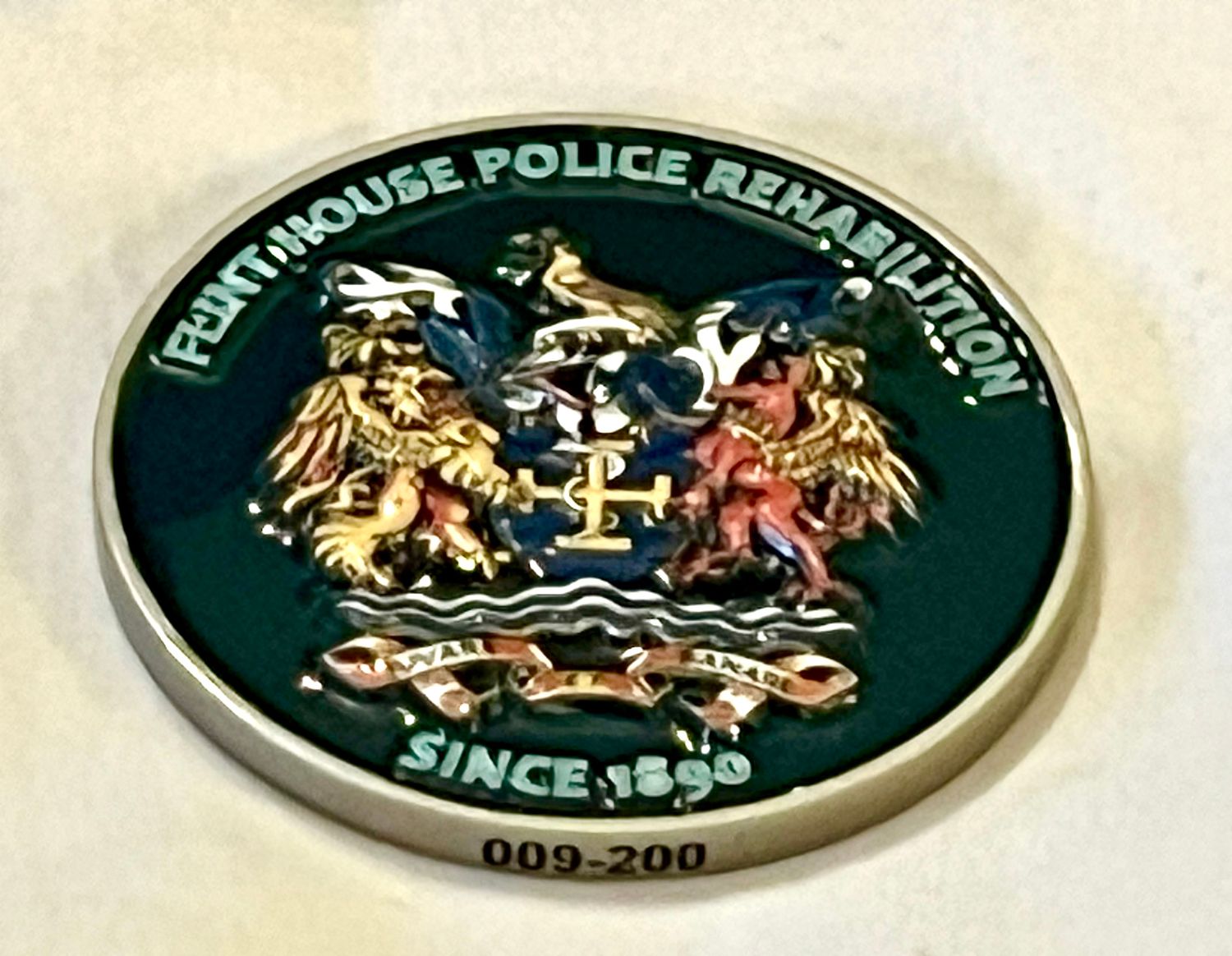 Flint House Rehabilitation challenge coin