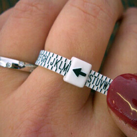 Multi-sizer Ring Gauge U.K. with instruction envelope.