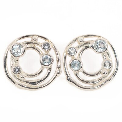 Silver Cyclone 3 Sky Blue Topaz Stud Earrings