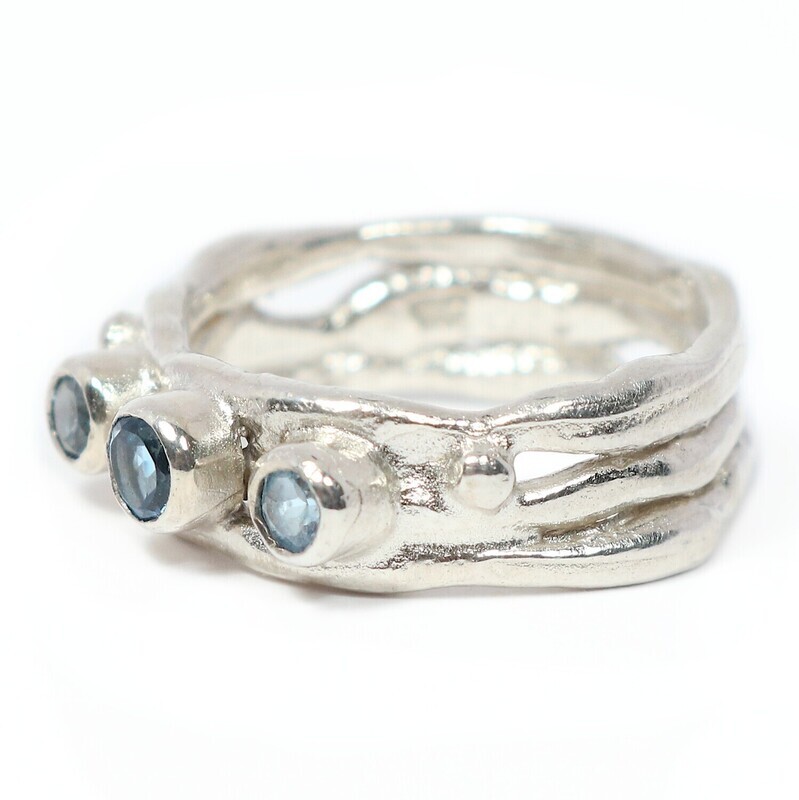 Silver Swiss Blue Topaz Cyclone 3 Ring