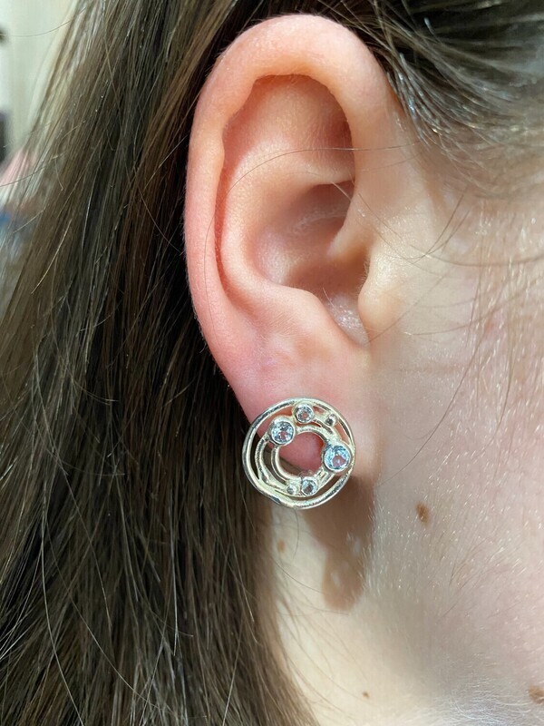 Silver Cyclone 3 Sky Blue Topaz Stud Earrings