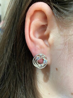 Silver Cyclone 3 Sky Blue Topaz Stud Earrings