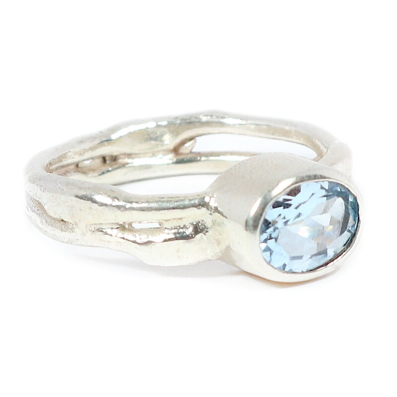 Silver Oval Sky Blue Topaz Cyclone 2 Ring