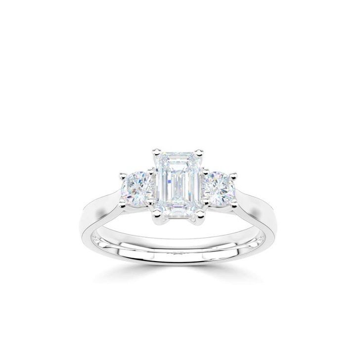 Platinum Emerald Cut And Round Diamond Three Stone Ring