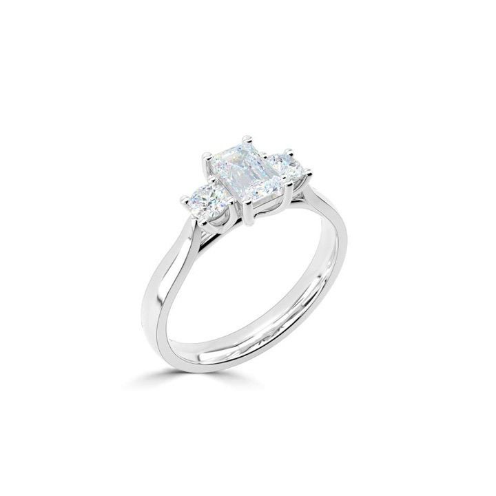 Platinum Emerald Cut And Round Diamond Three Stone Ring