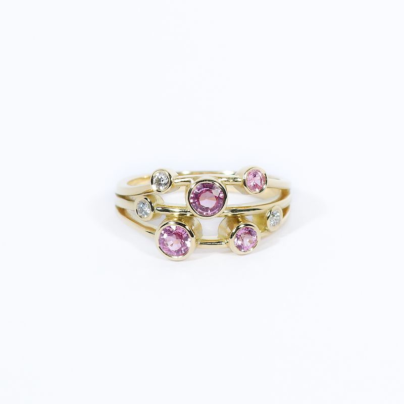 18ct Gold t Diamond &amp; Pink Sapphire Seven-Stone Polished Twister Ring