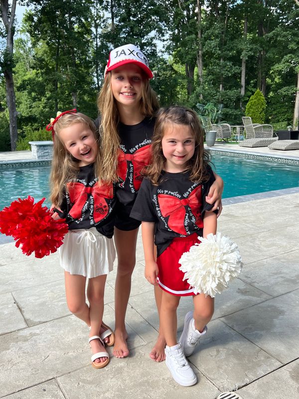 Black Tee with Red Bow Design